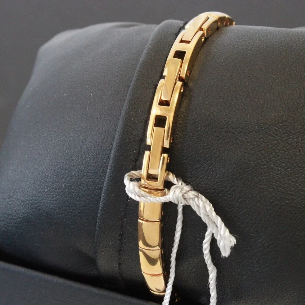 Caravelle Ladies Gold Tone Quartz Watch, MOP Dial, ½ Bangle Bracelet 16mm